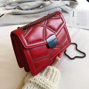 Rivet studded shoulder bags